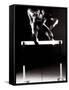 Portrait of a Young Man Jumping over a Hurdle-null-Framed Stretched Canvas