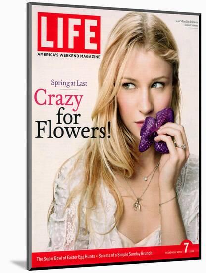 Portrait of Actress Emilie De Ravin Holding an Orchid Flower, April 7, 2006-Karina Taira-Mounted Photographic Print