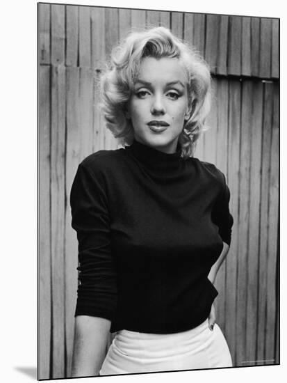 Portrait of Actress Marilyn Monroe on Patio of Her Home-Alfred Eisenstaedt-Mounted Premium Photographic Print