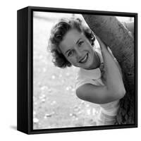 Portrait of American Actress Debbie Reynolds as She Poses Behind a Tree, 1950-Loomis Dean-Framed Stretched Canvas