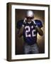 Portrait of an American Football Player Removing His Helmet-null-Framed Premium Photographic Print