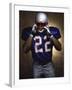 Portrait of an American Football Player Removing His Helmet-null-Framed Photographic Print