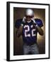 Portrait of an American Football Player Removing His Helmet-null-Framed Photographic Print