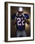 Portrait of an American Football Player Removing His Helmet-null-Framed Photographic Print