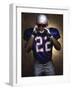 Portrait of an American Football Player Removing His Helmet-null-Framed Photographic Print