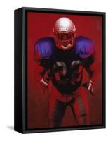 Portrait of an American Football Player Standing in a Tackle Pose-null-Framed Stretched Canvas