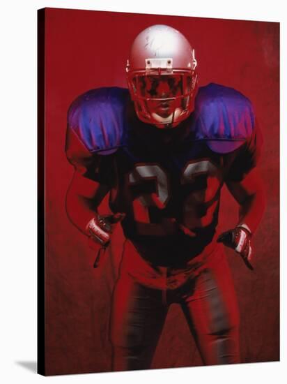 Portrait of an American Football Player Standing in a Tackle Pose-null-Stretched Canvas