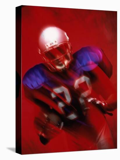 Portrait of an American Football Player Standing in a Tackle Pose-null-Stretched Canvas