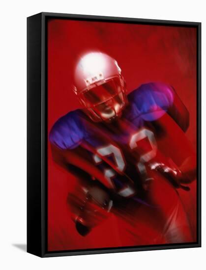 Portrait of an American Football Player Standing in a Tackle Pose-null-Framed Stretched Canvas