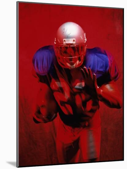 Portrait of an American Football Player Standing in a Tackle Pose-null-Mounted Photographic Print