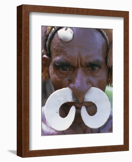 Portrait of an Asmat Man with Nose Ornament, Papua New Guinea, Pacific-Claire Leimbach-Framed Photographic Print