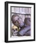 Portrait of an Asmat Tribesman Leaning on a Human Skull, Irian Jaya, Indonesia-Claire Leimbach-Framed Photographic Print