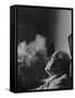 Portrait of Architect Mies Van Der Rohe Exhaling Smoke-Frank Scherschel-Framed Stretched Canvas