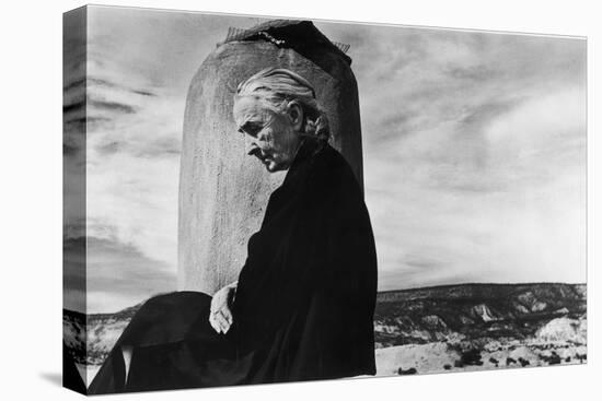 Portrait of Artist Georgia O'Keeffe Sitting on the Roof of Her Ghost Ranch Home-John Loengard-Stretched Canvas