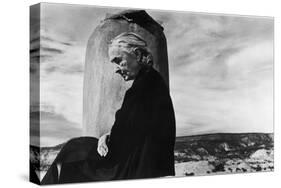 Portrait of Artist Georgia O'Keeffe Sitting on the Roof of Her Ghost Ranch Home-John Loengard-Stretched Canvas