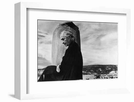 Portrait of Artist Georgia O'Keeffe Sitting on the Roof of Her Ghost Ranch Home-John Loengard-Framed Photographic Print