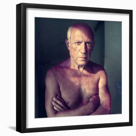 Portrait of Artist Pablo Picasso, Arms Folded Across Bare Chest, at His Home, Alone-Gjon Mili-Framed Premium Photographic Print