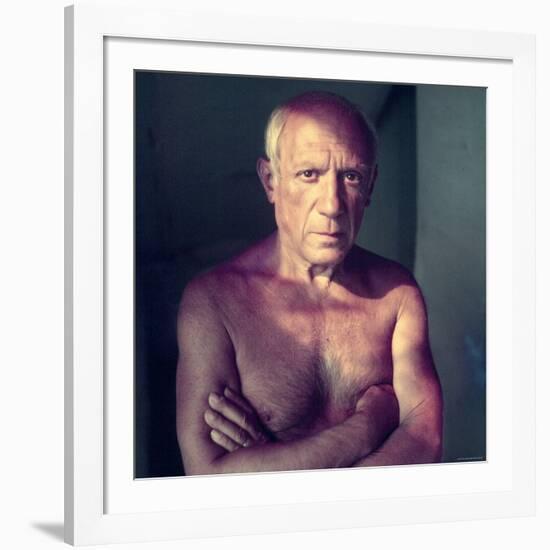 Portrait of Artist Pablo Picasso, Arms Folded Across Bare Chest, at His Home, Alone-Gjon Mili-Framed Premium Photographic Print