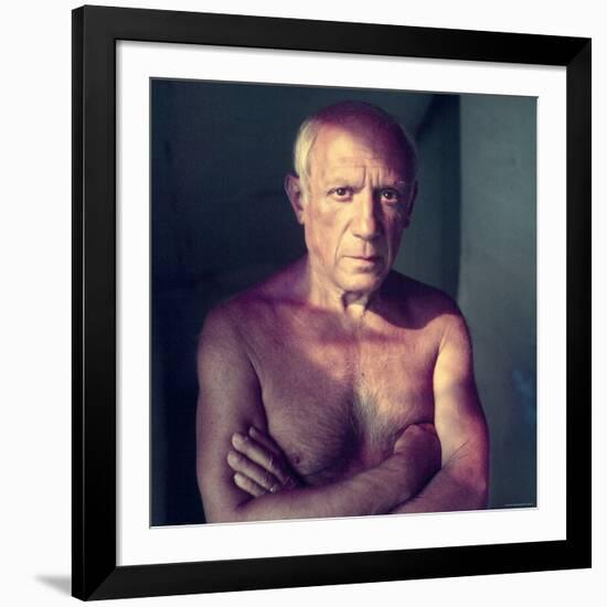 Portrait of Artist Pablo Picasso, Arms Folded Across Bare Chest, at His Home, Alone-Gjon Mili-Framed Premium Photographic Print