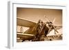 Portrait of Beautiful Female Pilot with Plane Behind. Sepia Photo.-Aleksandar Todorovic-Framed Art Print