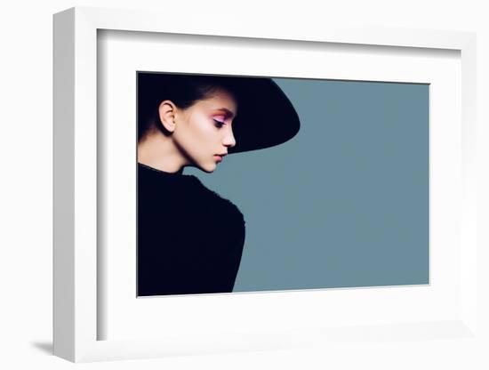 Portrait of Beautiful Girl in Hat in Profile, Posing in Studio-Yuliya Yafimik-Framed Photographic Print