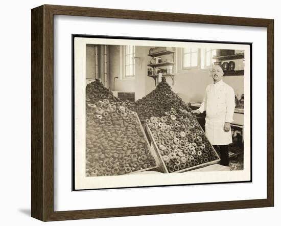 Portrait of Chef Leoni with Bins of Doughnuts for the Salvation Army at the Hotel Commodore, 1919-Byron Company-Framed Giclee Print