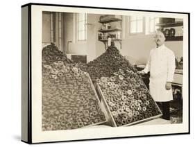 Portrait of Chef Leoni with Bins of Doughnuts for the Salvation Army at the Hotel Commodore, 1919-Byron Company-Stretched Canvas