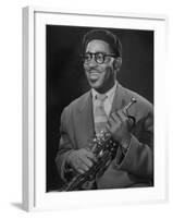 Portrait of Dizzy Gillespie, "Bebop" King, Holding His Trumpet-Allan Grant-Framed Premium Photographic Print