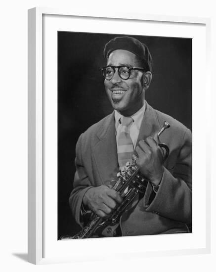 Portrait of Dizzy Gillespie, "Bebop" King, Holding His Trumpet-Allan Grant-Framed Premium Photographic Print