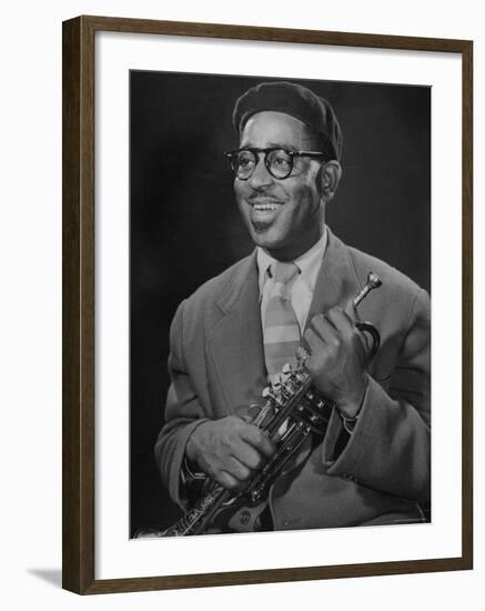 Portrait of Dizzy Gillespie, "Bebop" King, Holding His Trumpet-Allan Grant-Framed Premium Photographic Print