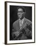 Portrait of Dizzy Gillespie, "Bebop" King, Holding His Trumpet-Allan Grant-Framed Premium Photographic Print