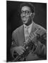 Portrait of Dizzy Gillespie, "Bebop" King, Holding His Trumpet-Allan Grant-Mounted Premium Photographic Print