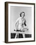 Portrait of Female Tennis Player at the Net-null-Framed Photo