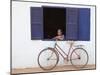 Portrait of Man Looking Out of Window, Vang Vieng, Laos-Ian Trower-Mounted Photographic Print