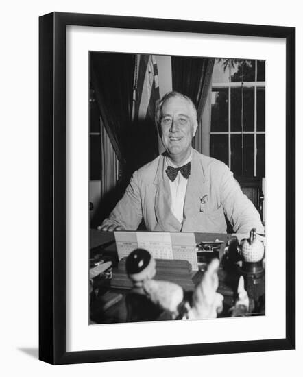 Portrait of President Franklin Roosevelt Alone, Smiling, at Desk in White House-George Skadding-Framed Photographic Print