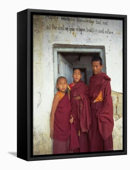 Portrait of Three Tibetan Buddhist Monks, Tashi Jong Monastery, Tibet, China-Simon Westcott-Framed Stretched Canvas