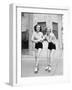 Portrait of Two Young Women with Roller Blades Skating on the Road and Smiling-Everett Collection-Framed Photographic Print