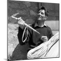 Portrait of Walter Bonatti Smiling with a Climbing Pickaxe in His Hands-Sergio del Grande-Mounted Giclee Print