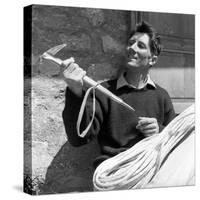 Portrait of Walter Bonatti Smiling with a Climbing Pickaxe in His Hands-Sergio del Grande-Stretched Canvas