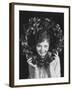 Portrait of Woman Holding Christmas Wreath-null-Framed Photo