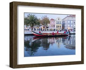 Portugal, Aveiro. Moliceiro boat on the canal.-Julie Eggers-Framed Photographic Print