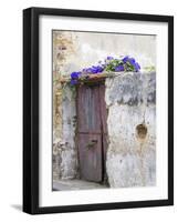 Portugal, Aveiro. Old red metal door with bright blue and pink morning glory flower-Julie Eggers-Framed Photographic Print