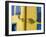 Portugal, Aveiro. Shadow of street lantern on colorful yellow building with bright blue shutters.-Julie Eggers-Framed Photographic Print