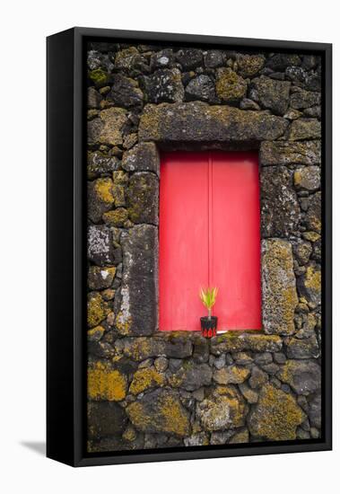 Portugal, Azores, Pico Island, Madalena. Red doors on barn-Walter Bibikow-Framed Stretched Canvas