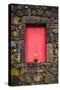 Portugal, Azores, Pico Island, Madalena. Red doors on barn-Walter Bibikow-Stretched Canvas
