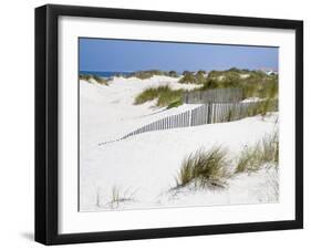 Portugal, Costa Nova. Beach grass, sand and old fence line at the beach resort of Costa Nova-Julie Eggers-Framed Photographic Print