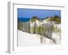 Portugal, Costa Nova. Beach grass, sand and old fence line at the beach resort of Costa Nova-Julie Eggers-Framed Photographic Print