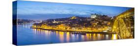 Portugal, Douro Litoral, Porto. Dusk in the UNESCO listed Ribeira district.-Nick Ledger-Stretched Canvas