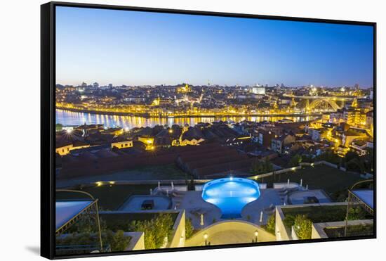 Portugal, Douro Litoral, Porto. Dusk view towards the old town of Porto and the Ribeira district fr-Nick Ledger-Framed Stretched Canvas