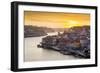 Portugal, Douro Litoral, Porto. Sunset over the UNESCO listed Ribeira district, viewed from Dom Lui-Nick Ledger-Framed Photographic Print